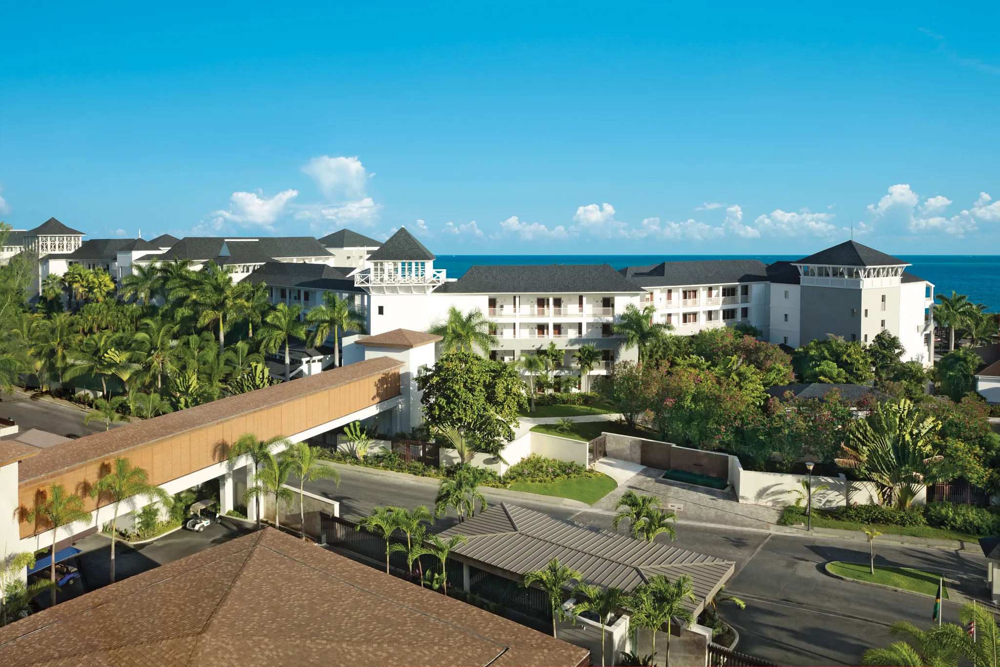 Elevated skywalk bridge connecting the buildings at Breathless Montego Bay Resort.