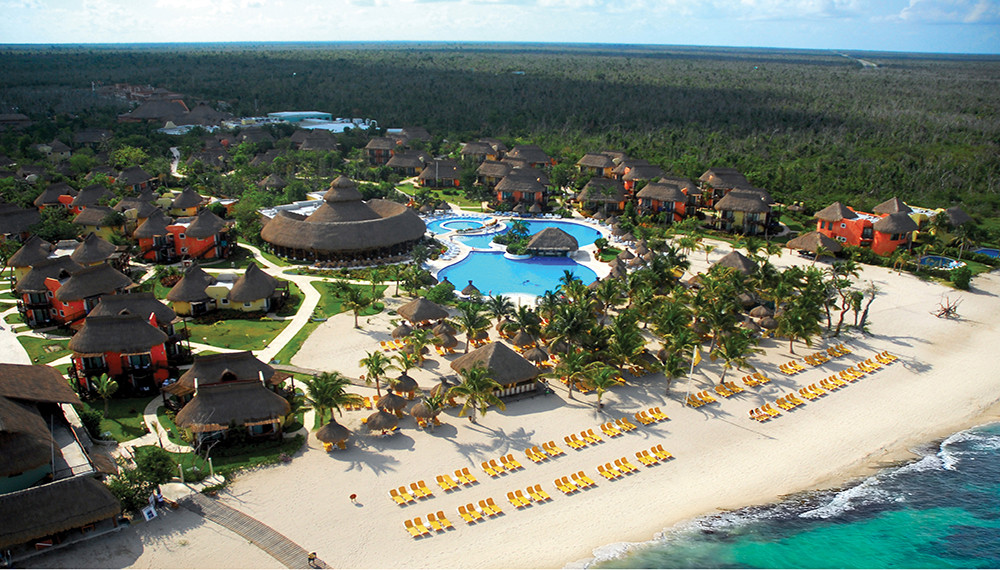 Iberostar Cozumel all-inclusive resort surrounded by jungle with beachfront access and renowned dive center on Cozumel Island.