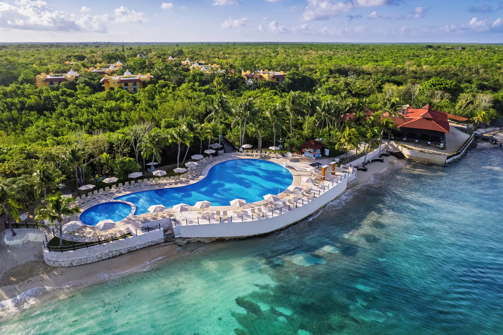 Occidental Cozumel all-inclusive resort with beachfront setting, tropical gardens, and dive center on Cozumel island Mexico.